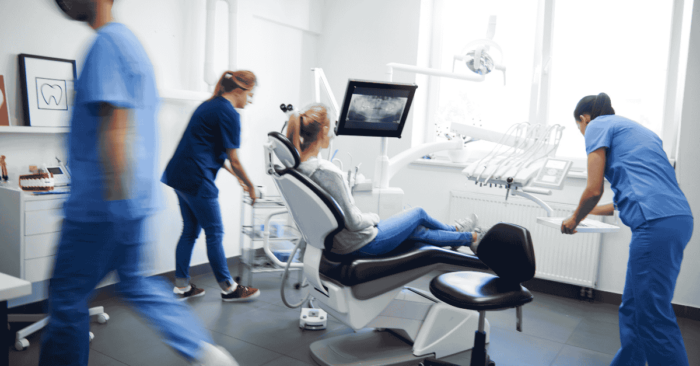 dental clinic staff with a patient