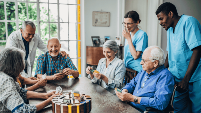 nursing home staff interacting with senior residents