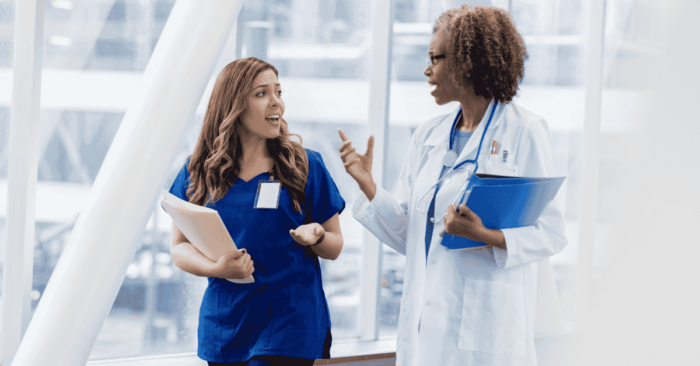 physicians walking in a hospital